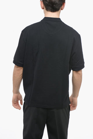 Polo-Shirt Loose Fit PIERCED NIPPLE aus Piqué-Baumwolle