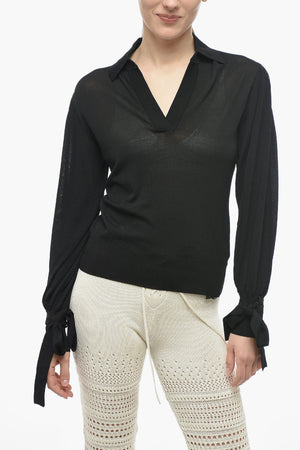 Top mit Polokragen und Schleifen am Ärmel