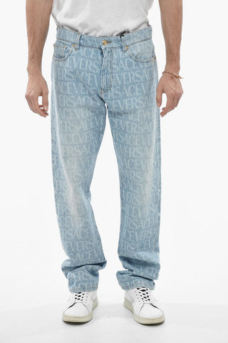 Light Wash MITCHEL Denims with All Over Logoed Pattern