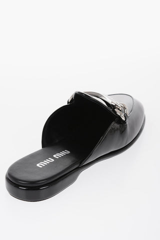 Patent Leather Mules Wiith Plaque Detail