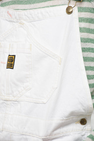 Denim-Latzhose mit Logoknöpfen in Gold