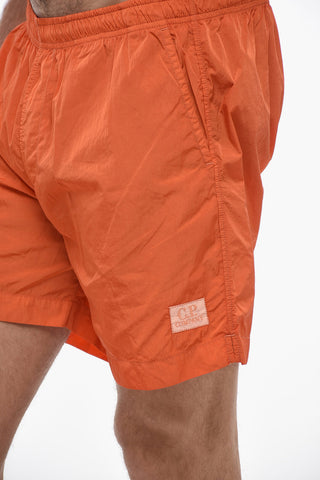 Solid Color Swim Shorts with Contrasting Logo