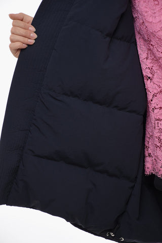 Piumino Smanicato Oversized con Cappuccio