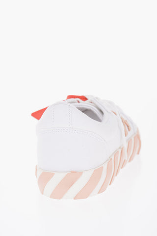 VULCANIZED Low Sneakers with Embroidered Arrow