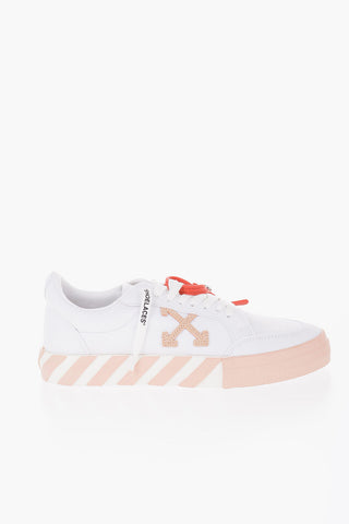 VULCANIZED Low Sneakers with Embroidered Arrow