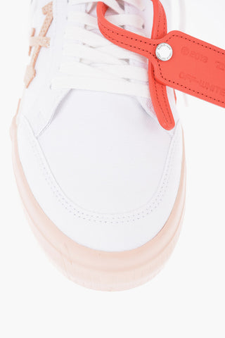 VULCANIZED Low Sneakers with Embroidered Arrow