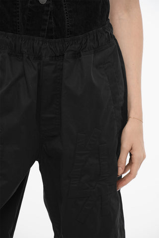 Solid-Color Shorts with Embossed Monogram