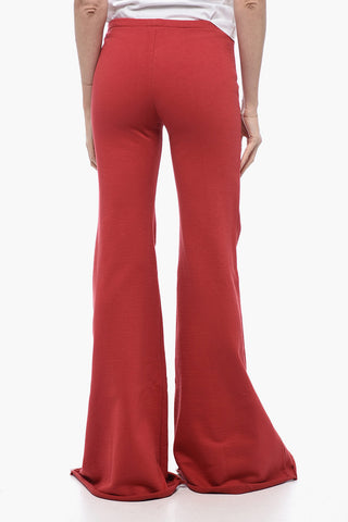 Joggers Svasati con Orlo a Taglio Vivo