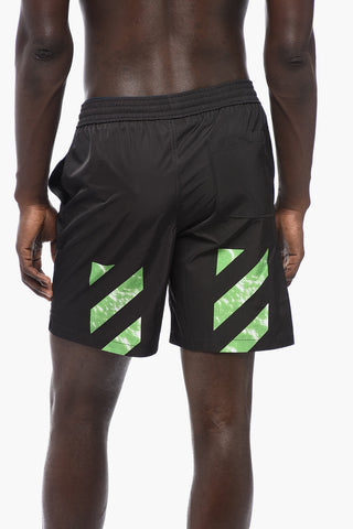 Solid Color MOON TAB Swim Shorts with Contrasting Print
