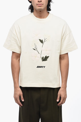 T-Shirt Girocollo in Tinta Unita con Ricamo Floreale