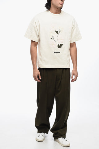 T-Shirt Girocollo in Tinta Unita con Ricamo Floreale