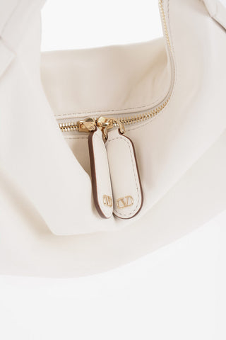 GARAVANI Solid Color Leather Hobo Bag with Golden Details
