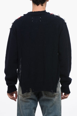 MM0 Crew Neck Wool Sweater with Distressed Design
