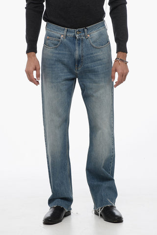Stone-washed Denims with Fringed Hem