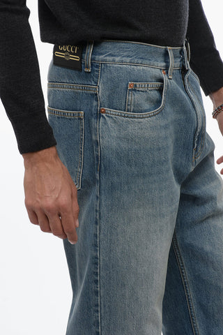 Stone-washed Denims with Fringed Hem