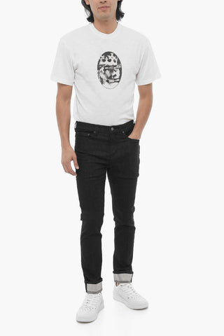 Jeans Skinny Fit a lavaggio Scuro ad Orlo con Risvolto