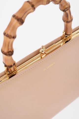 Bamboo Handle Leather Handbag with Clip Clap Closure