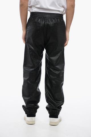 Pantaloni in Pelle Goffrata con Polsini