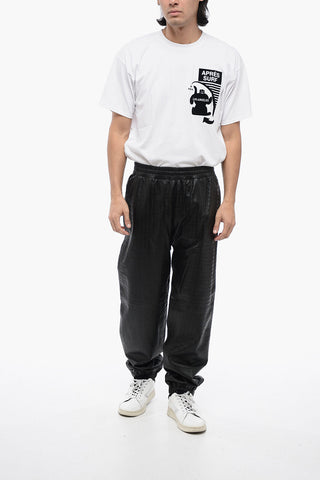 Pantaloni in Pelle Goffrata con Polsini