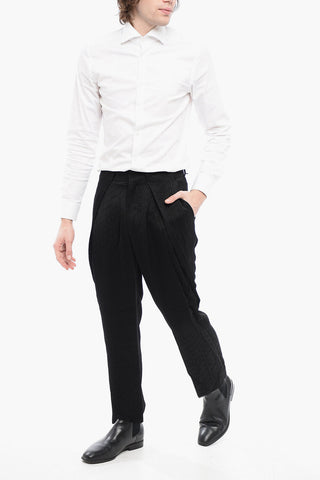 Hose mit einer Falte aus Jacquard-Viscose mit Monogramm-Muster