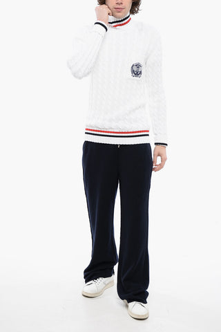 Turtleneck Cable Knit Cotton Sweater with Embroidered Emblem
