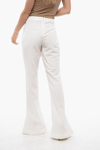 뒷지퍼 부착 부트컷 스키니 핏 팬츠