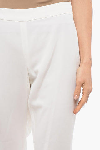 뒷지퍼 부착 부트컷 스키니 핏 팬츠