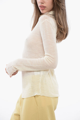 Rollkragenpullover mit transparentem Effekt