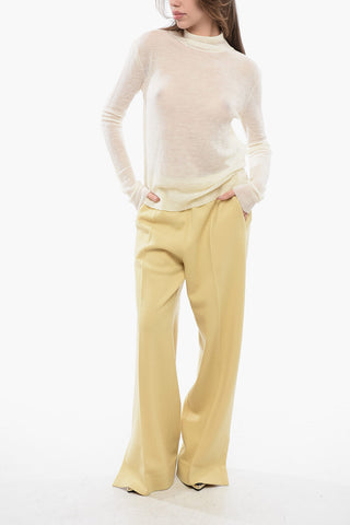 Rollkragenpullover mit transparentem Effekt