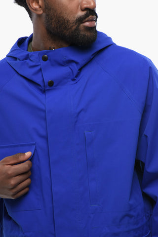Multipocketed MOUNTAIN Windbreaker with Hidden Closure