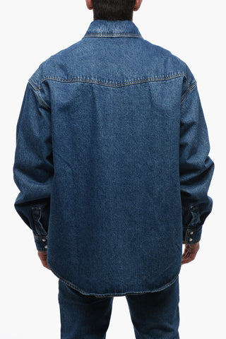 Giubbotto in Denim Lavaggio Scuro con Monogramma in Rilievo
