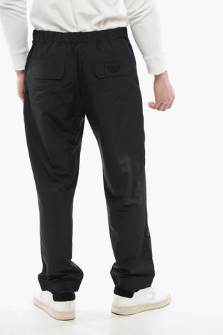 Joggers in Nylon con Zip Laterale