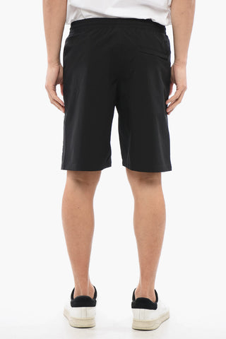 Solid Color BRAME Swim Shorts with Tone on Tone Logo
