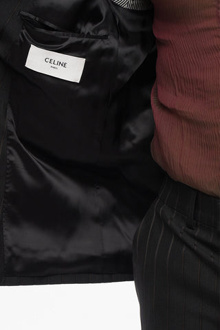 Double-breasted Pinstriped Wool Blazer with Peak Lapel