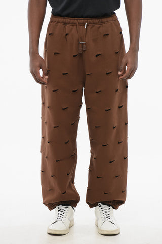 JACQUEMUS Solid Color SWOOSH Joggers with All-Over Cut-Out Details