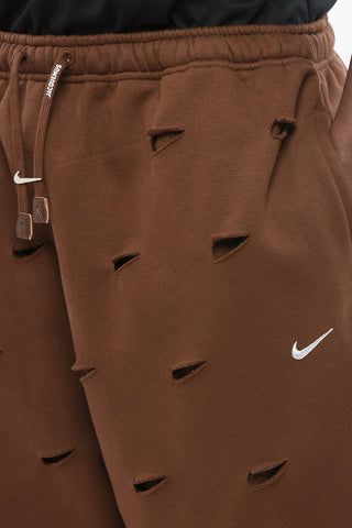 JACQUEMUS Solid Color SWOOSH Joggers with All-Over Cut-Out Details