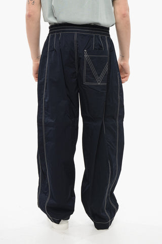 Tech Nylon Baggy Pants with Visible Stitchings
