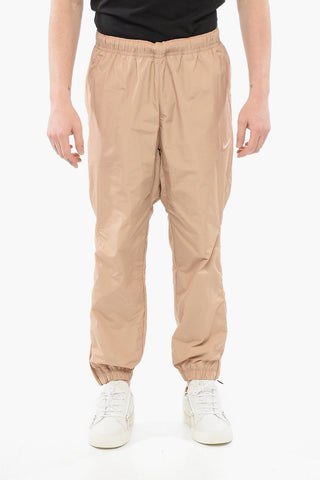 NOCTA Technical Nylon Pants with Ankle Zip And Drawstring Waist