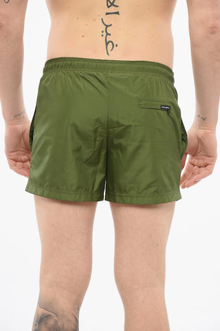 Solid Color Swim Shorts with Embossed Monogram