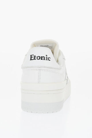 Solid Color Leather Low Top Sneakers with Contrasting Logo