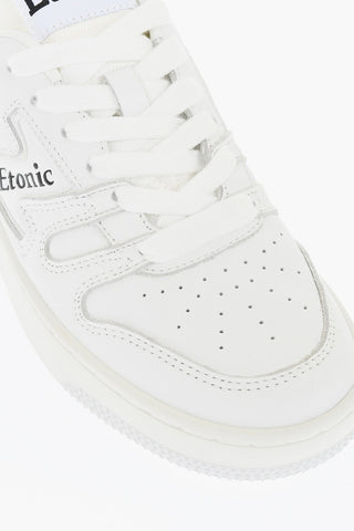 Solid Color Leather Low Top Sneakers with Contrasting Logo
