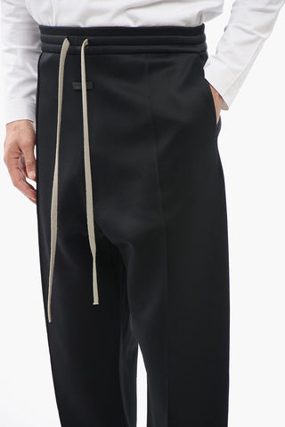Joggers in Neoprene con Pince Frontale