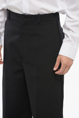 Vier-Taschen-Hose aus Wolle mit Satin-Seitenstreifen