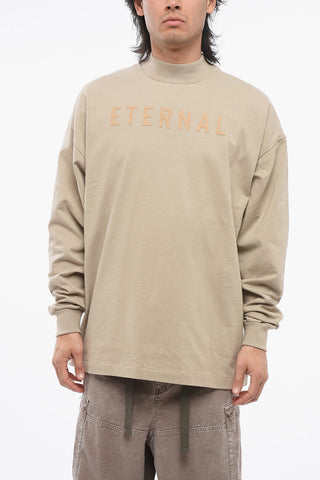 Crew Neck ETERNAL T-Shirt with Cuffs and Flocked Logo