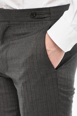 Pinstriped Single Breasted Wool Suit With Peak Lapel