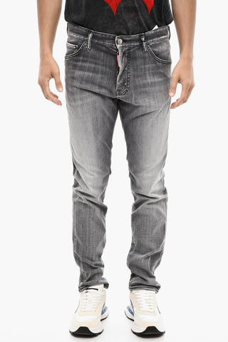 Stonewashed Jeans with Logo Buttons