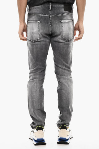 Stonewashed Jeans with Logo Buttons