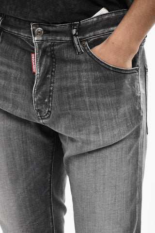 Stonewashed Jeans with Logo Buttons