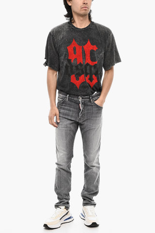 Stonewashed Jeans with Logo Buttons