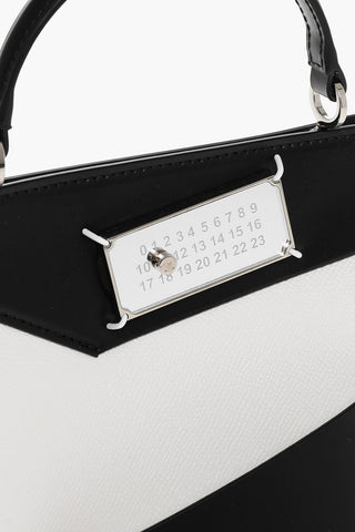 Schultertasche aus zweifarbigem Leder SNATCHED